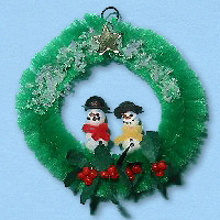 groene_krans_met_sneeuwmannen